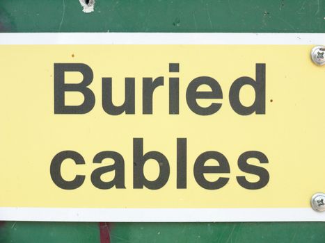 electrical hazard sign yellow buried cables