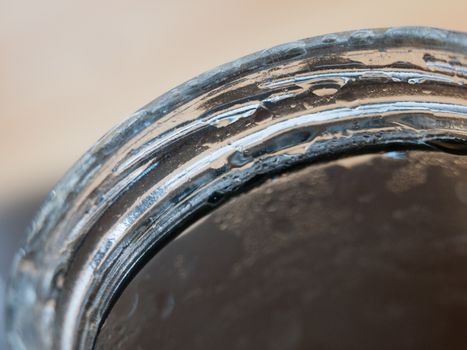 rim of jar glass empty and see through close up