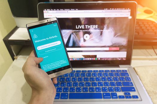 CHIANG MAI, THAILAND - Oct 15 2016 : Close up Android device Showing Airbnb application on the screen. Airbnb is a website for people to list, find, and rent lodging.