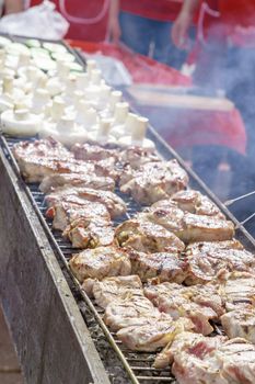 Assorted delicious grilled meat with vegetable over the coals