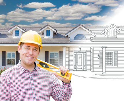 Male Contractor Wearing Hard Hat In Front of House Drawing Gradation Into Photograph.