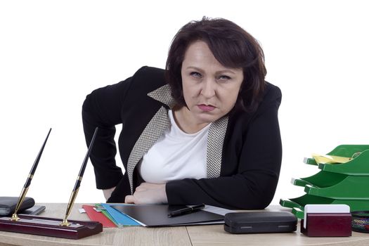 Terrible business woman at the desk on a white background