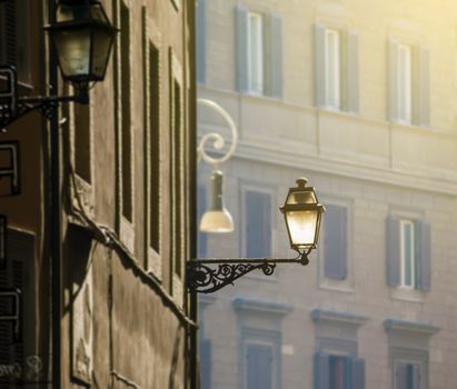 antique decorated city lamp in Rome, Italy