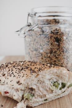 Delicious sandwich with tuna and vegetables. White seeds bread.