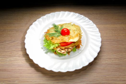 Homemade chicken burger on wood background. Potato pancake chicken burger