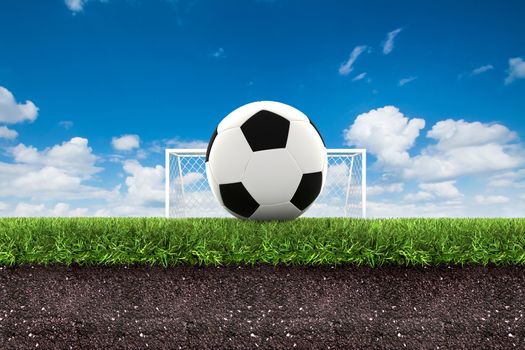 football on green grass with soil on blue sky.,3d rendering