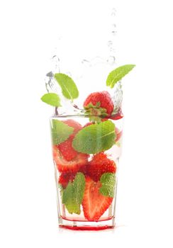 Strawberry mojito with splash isolated on white background