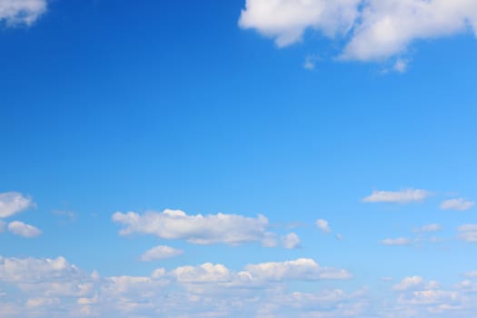 Blue gradient sky with clouds. Nature wallpaper background