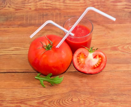 Drinking straws in tomato and tomato juice