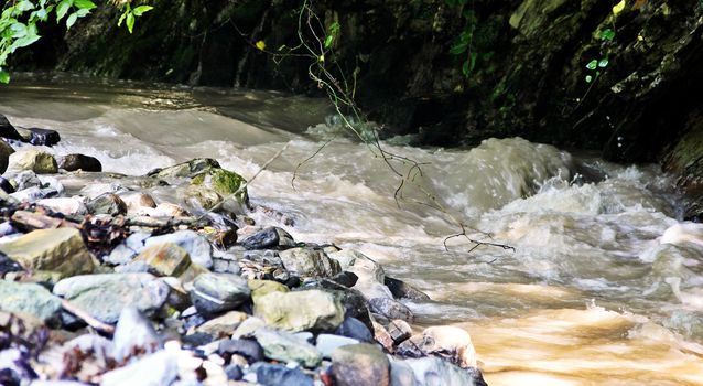 Stormy small mountain river after the rain in the mountains of the North Caucasus.