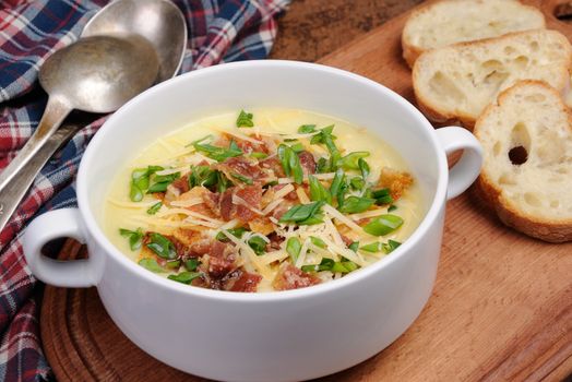 Creamy Loaded Baked Potato Soup with Bacon and Cheese,green onions