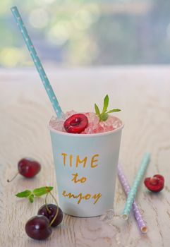 cherry syrup with ice in summer time