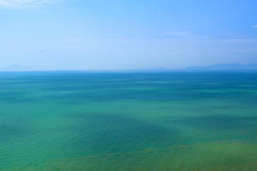 blue sky and green sea