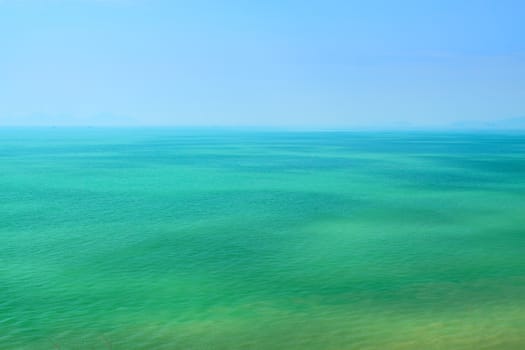 blue sky and green sea