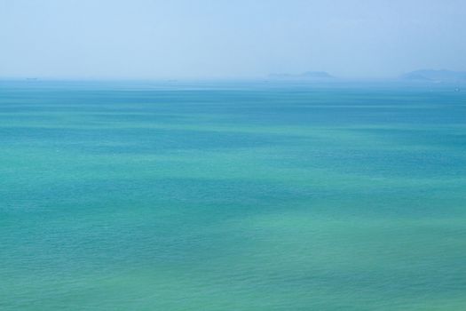 blue sky and green sea