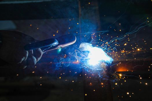 welding steel with sparks lighting