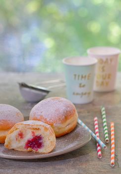 Fresh tasty donuts with jam