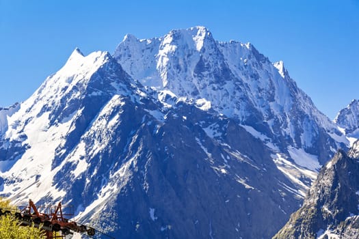 Blue landscape with Russian Caucasus rockies mountains