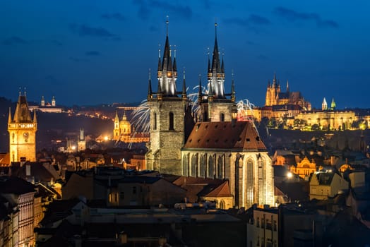 Night aerial view to Prague old town with Tyn church and St. Vitus cathedral