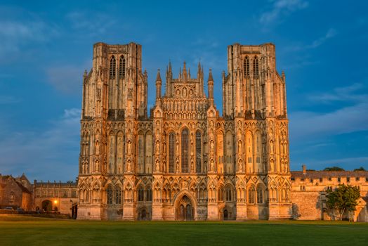 West front of Cathedral Church of Saint Andrew at night. The Wells Cathedral was built between 1175 and 1490.