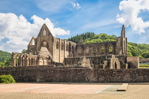 View of ruins of cistercian monastery Tintern in Wales on a sunny day.