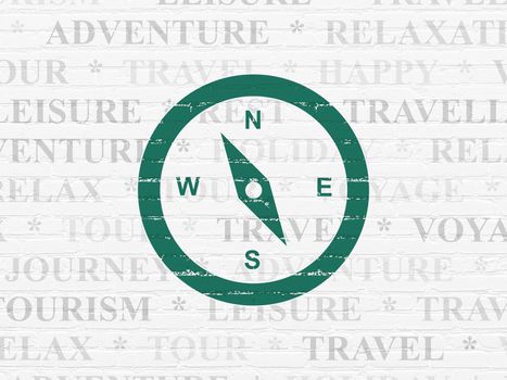 Tourism concept: Painted green Compass icon on White Brick wall background with  Tag Cloud