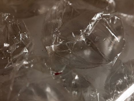 close up texture and pattern and detail of clear unpopped unused bubble wrap packaging