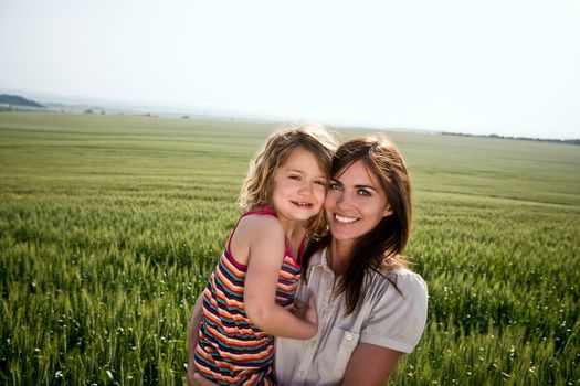 Woman and child in wheat-field