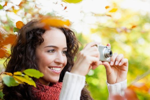 young woman taking photo