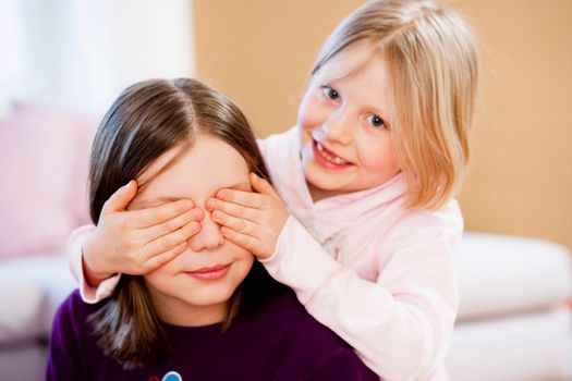 young sisters playing