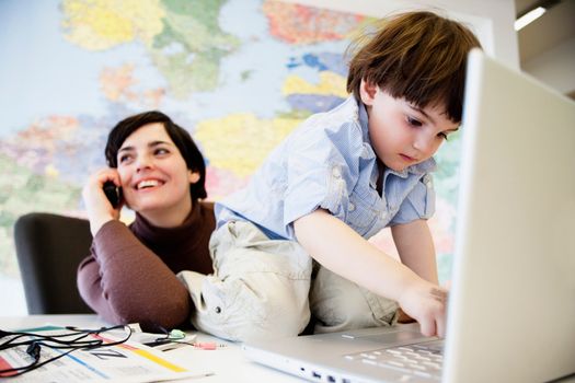 woman with boy in office