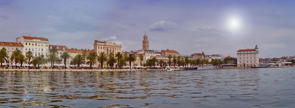 Daytime panoramic view on Riva waterfront, houses and Cathedral of Saint Domnius, Dujam, Duje, bell tower in old town, Split, Croatia