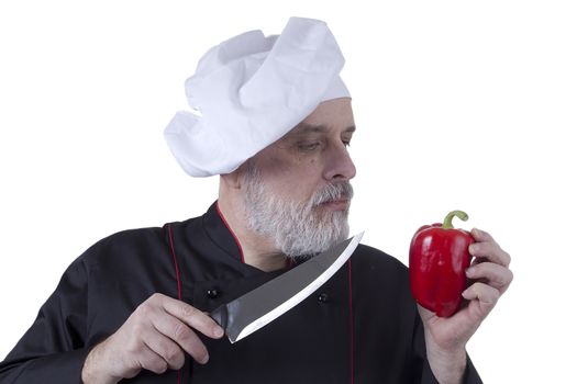 Chef with knife and paprika on white background