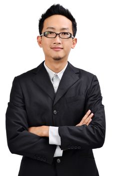 Front view of young crossed arms Asian businessman in full suit standing isolated on white background.