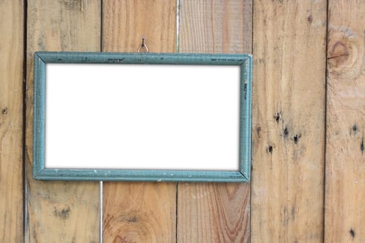 old vintage wooden photo frame on old wooden wall