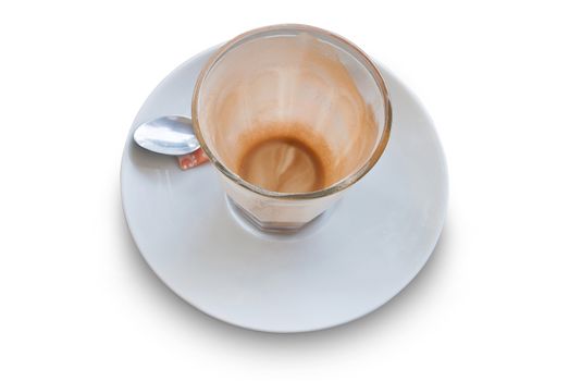 Empty glass cup of coffee latte on wooden table.