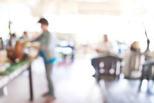 blurred background of people in restaurant