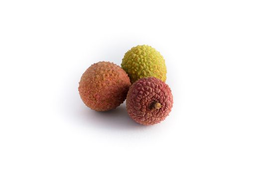 three lychee fruits isolated on white background