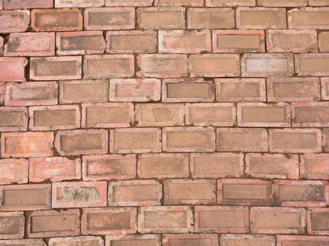 Red brick wall background. Classic beautiful texture of old vintage brick wall.