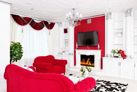 Classical living room interior with fireplace and beautiful curtains