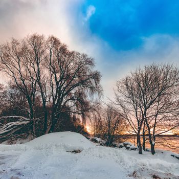 Cold winter snowy landscape at middle of the day