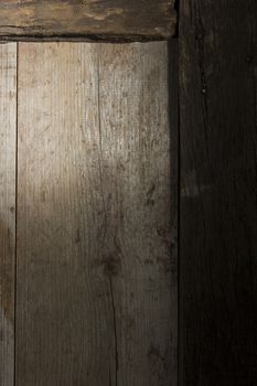 Fragment of an old wooden door as a background