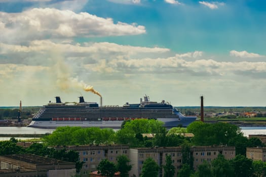 Large cruize liner. Passenger ship moored in old town