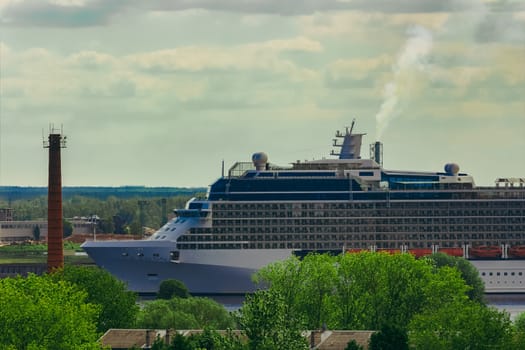 Large cruize liner. Passenger ship moored in old town