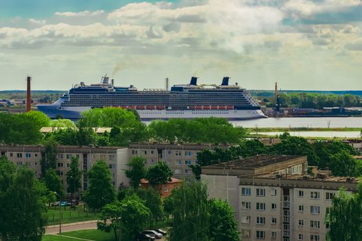 Large cruize liner. Passenger ship moored in old town