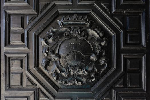 Pattern carving on a piece of wood in Seville, Spain, Europe