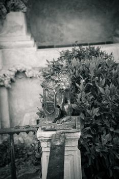 Iron bear holding a shield in Seville, Spain, Europe