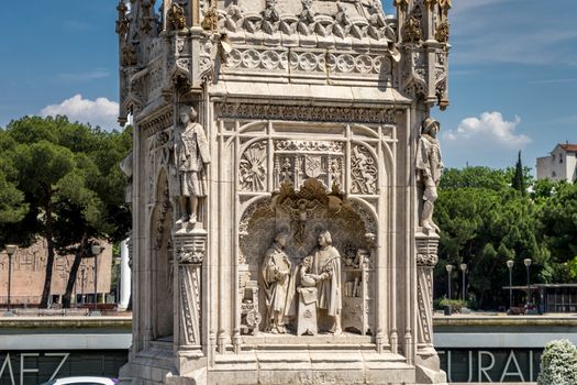 A scene from the Bible sculpted on a white marble in the city of Madrid, Spain, Europe