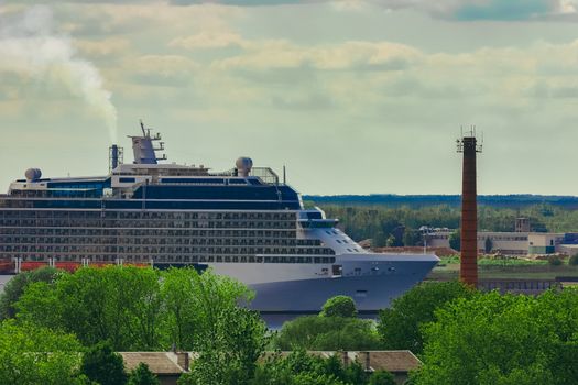 Large cruize liner. Passenger ship moored in old town