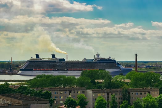 Large cruize liner. Passenger ship moored in old town
